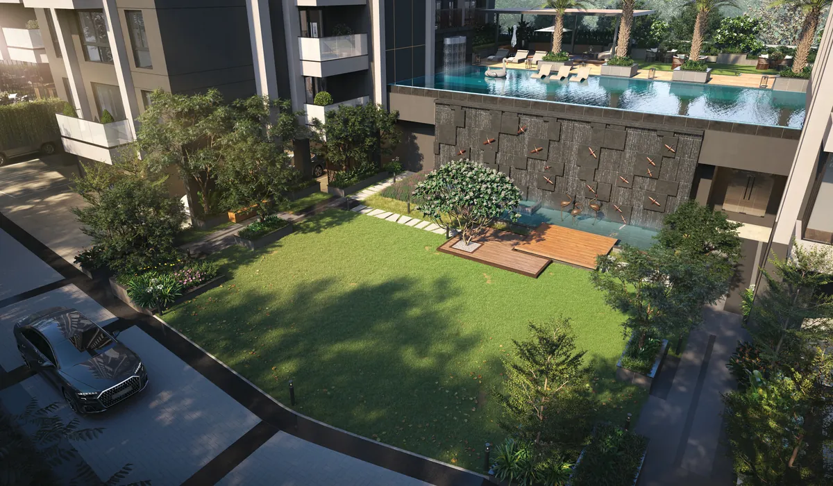 Central garden with water wall and podium pool in daylight